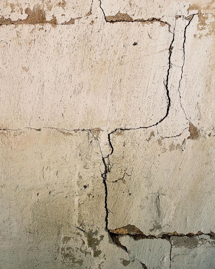 Stair-step cracks in a concrete block wall