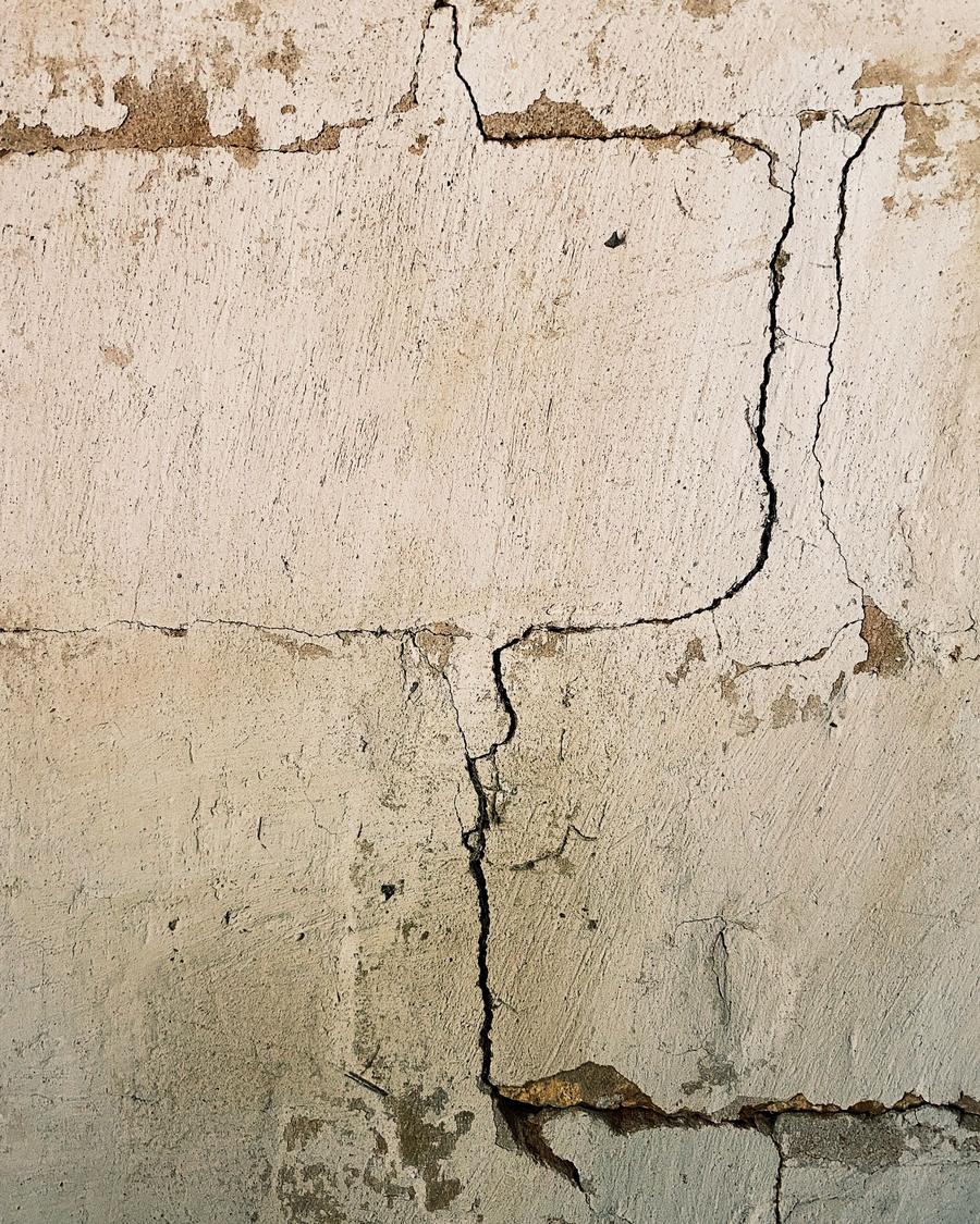 Stair-step cracks in a concrete block wall